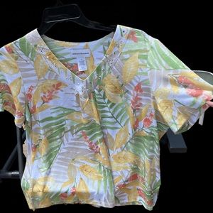 White T-shirt with floral/tropical pattern